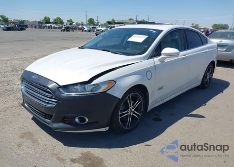 2014 Ford Fusion Energi Titanium from USA, damaged, VIN 3FA6P0SU2ER306913